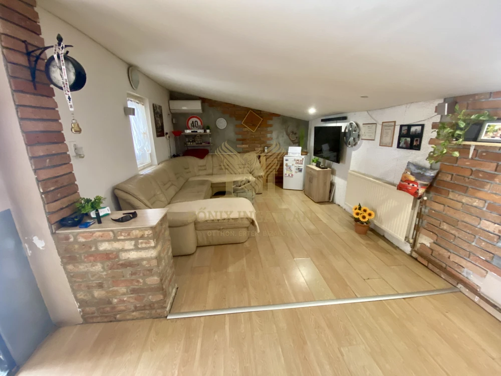 Tágas 100 nm-es családi ház eladó