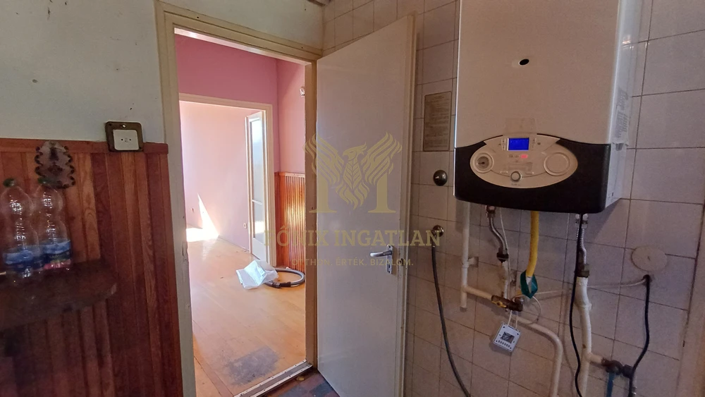 Természetközeli otthon a Rózsadombon – saját kertrésszel!