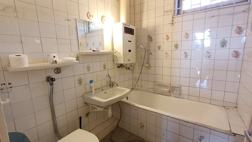 Természetközeli otthon a Rózsadombon – saját kertrésszel!